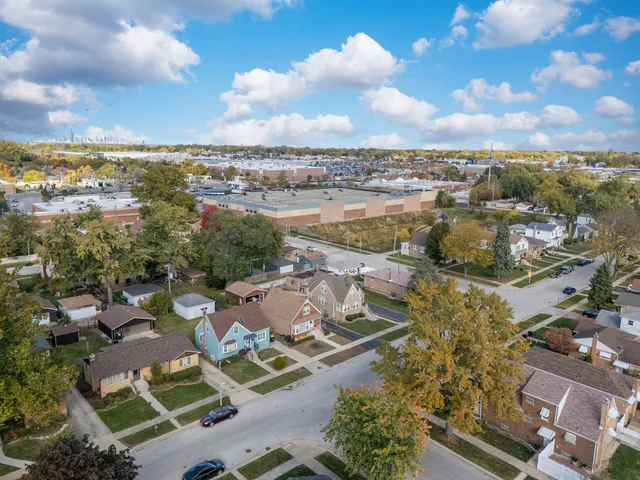 an aerial view of a city with lots of residential buildings