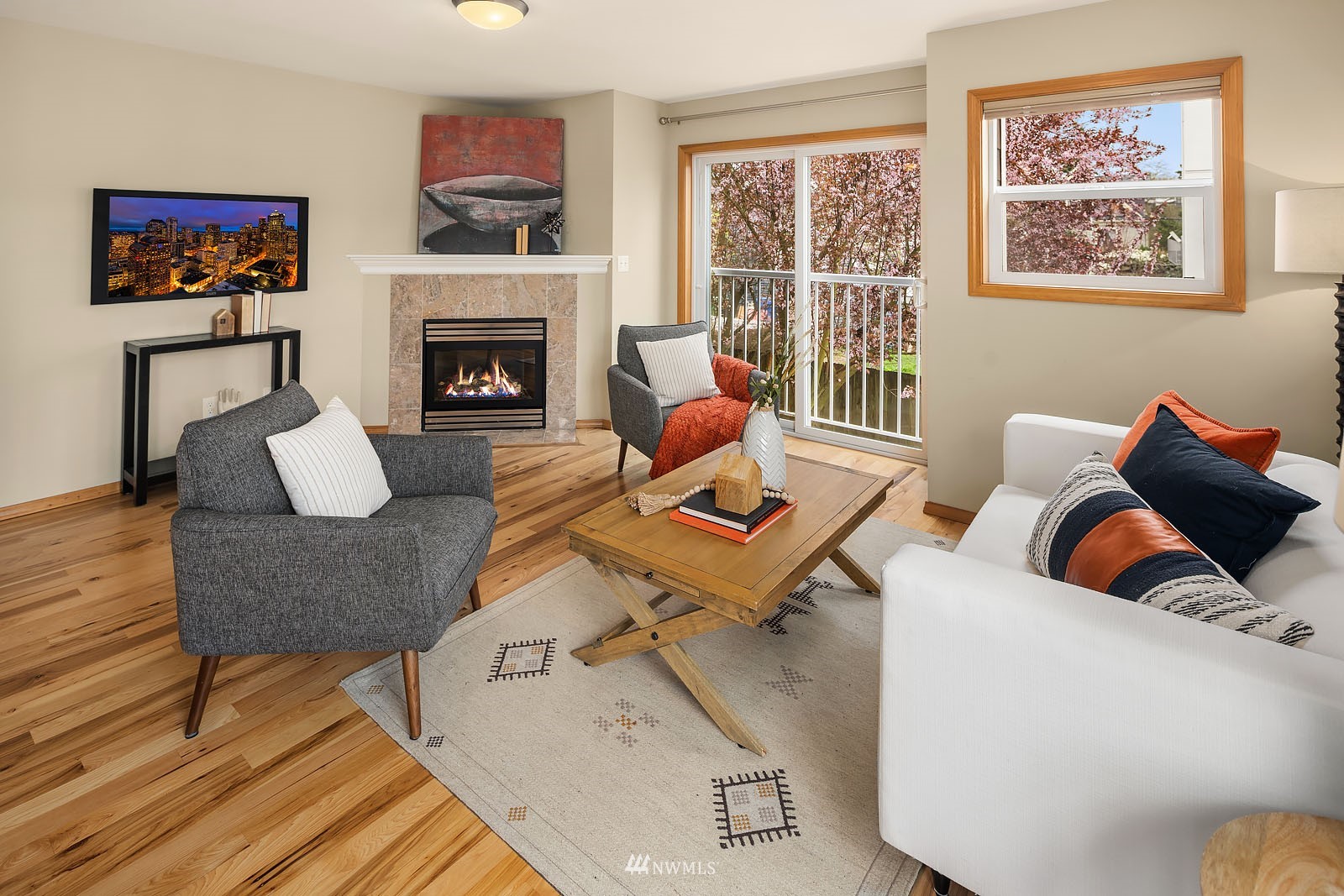 514 North 46th Street, Unit B Seattle, WA 98103 - Photo 6 of 30 a living room with furniture fireplace and window