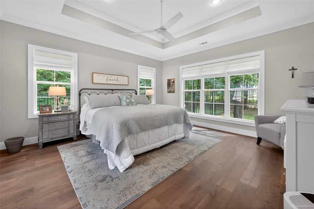 4747 Stonebridge Athens, TX 75751 - Photo 12 of 40 a bedroom with a bed and a large window