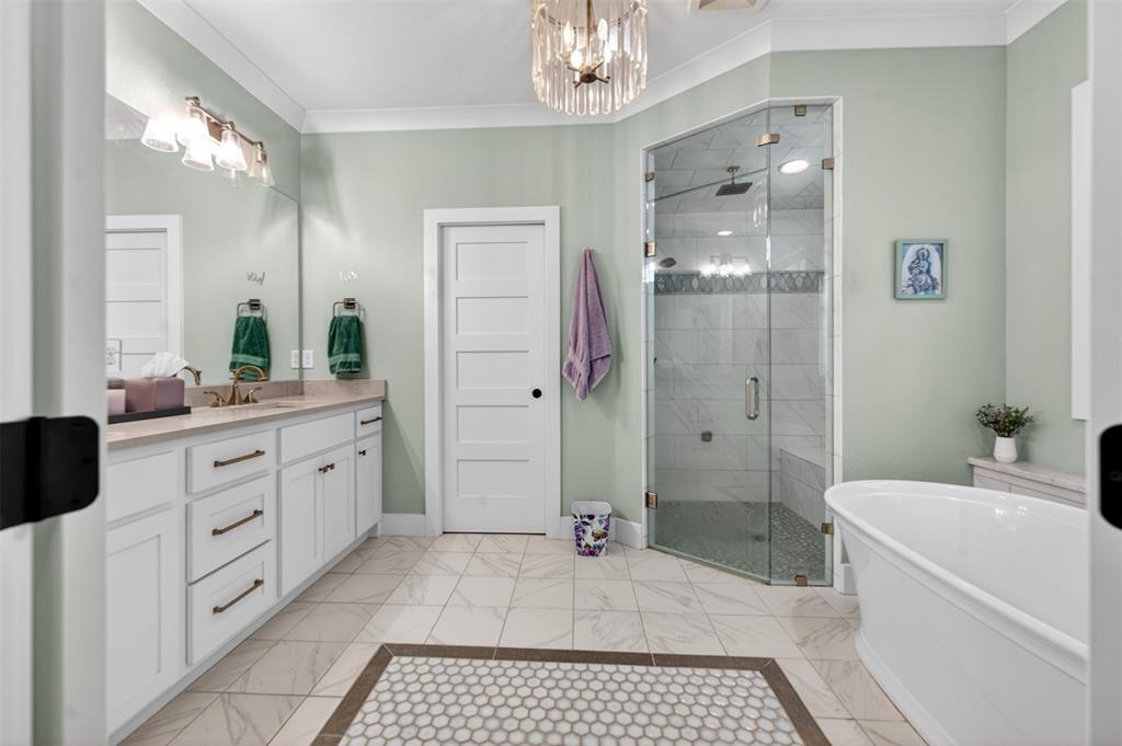 4747 Stonebridge Athens, TX 75751 - Photo 13 of 40 a bathroom with a tub a sink shower and mirror