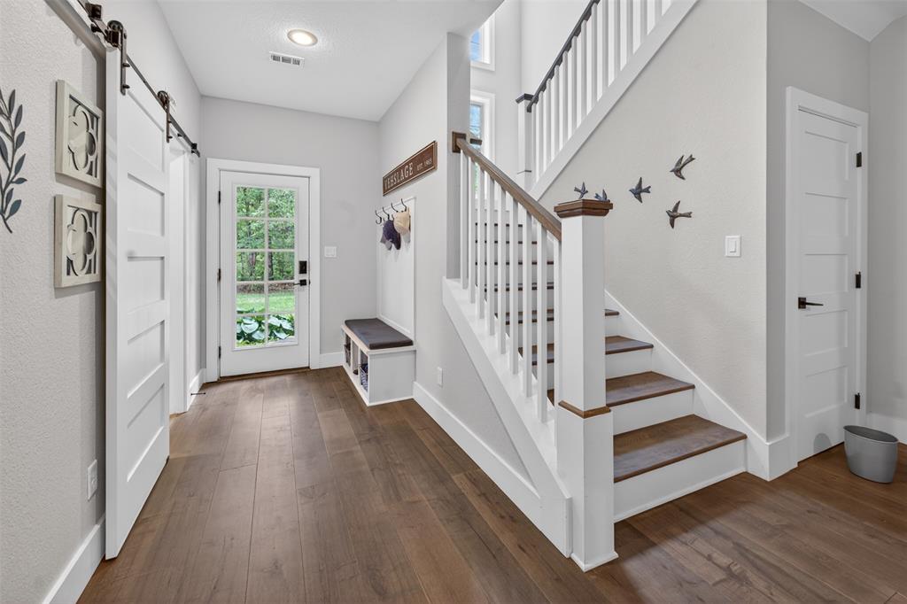 4747 Stonebridge Athens, TX 75751 - Photo 17 of 40 a view of entryway with wooden floor and stairs