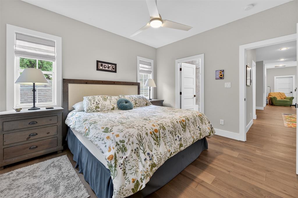 4747 Stonebridge Athens, TX 75751 - Photo 18 of 40 a bedroom with a bed and wooden floor