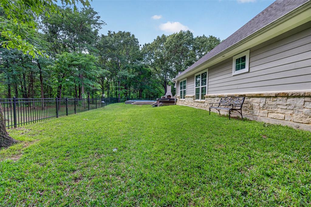 4747 Stonebridge Athens, TX 75751 - Photo 33 of 40 a view of a backyard with a garden