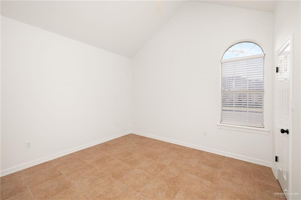 424 Canary Avenue McAllen, TX 78504 - Photo 11 of 17 an empty room with a window