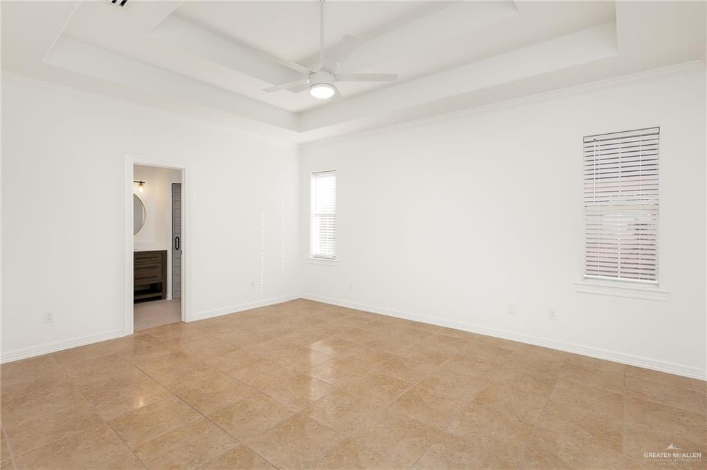 424 Canary Avenue McAllen, TX 78504 - Photo 9 of 17 an empty room with windows
