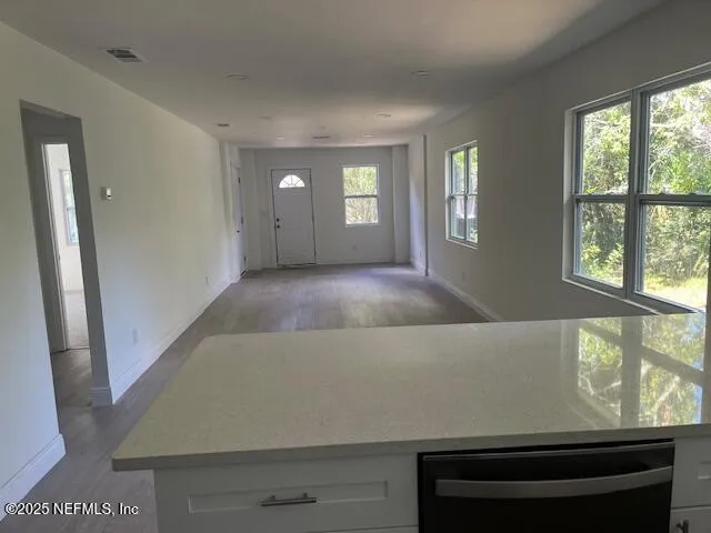 an empty room with windows