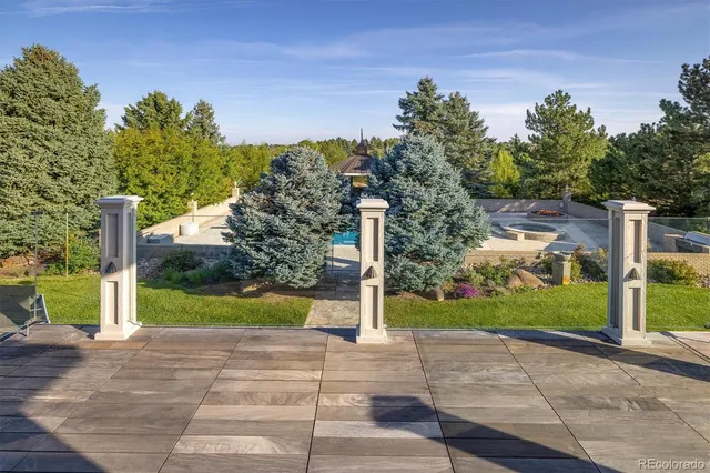 a view of a swimming pool with sitting space