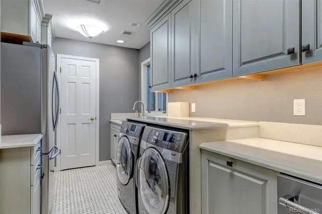 an empty room with furniture and a fireplace