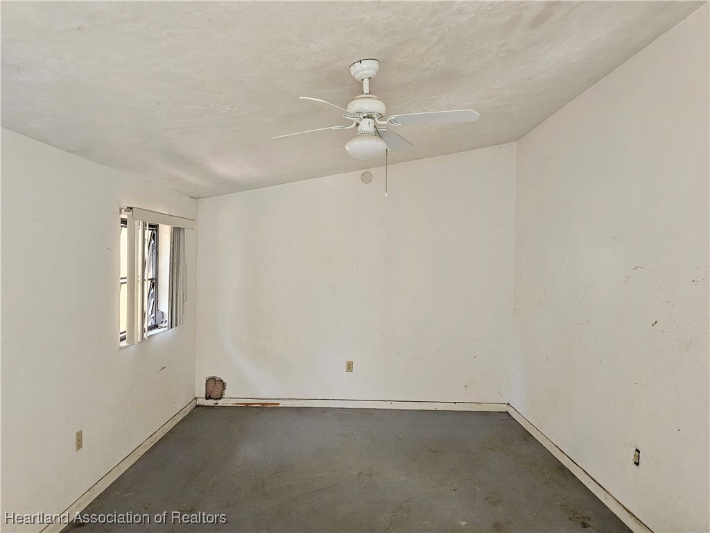 1237 Hitakee Avenue Sebring, FL 33870 - Photo 21 of 26 Bonus Room A - Step Down from Bedroom 2.