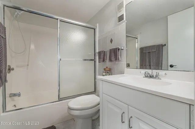 a view of a storage & utility room with washing machine
