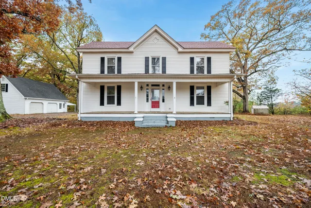a house with trees in front of it