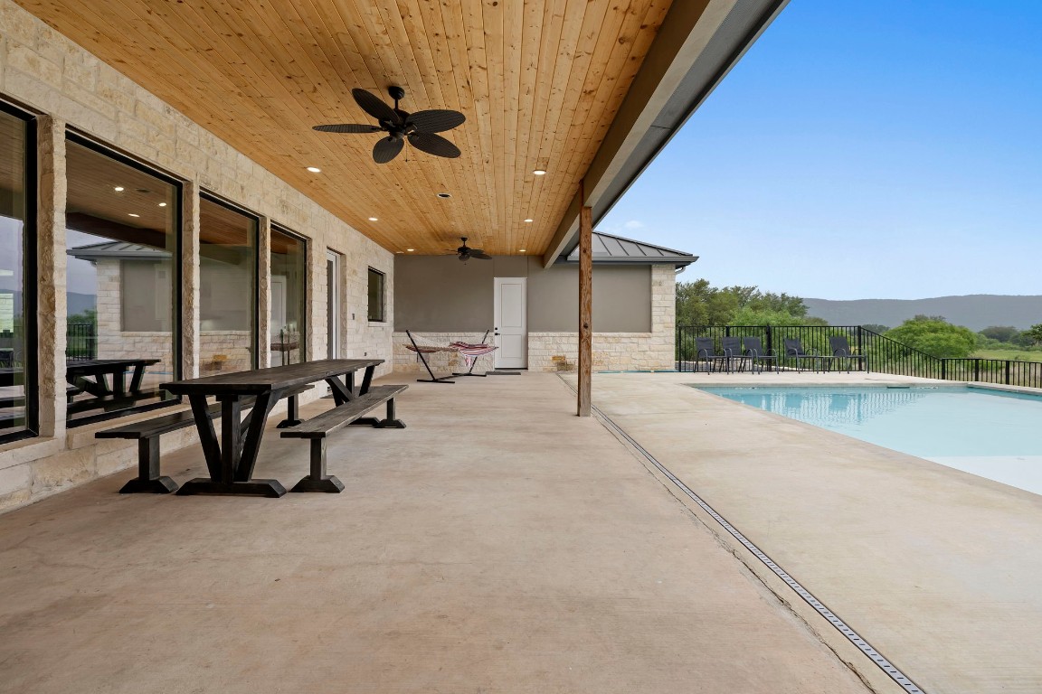 1463 Mountain Valley Road Concan, TX 78838 - Photo 28 of 43 a view of a terrace with chairs