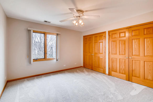 1777 Whispering Court Addison, IL 60101 - Photo 14 of 20 a view of an empty room with a window