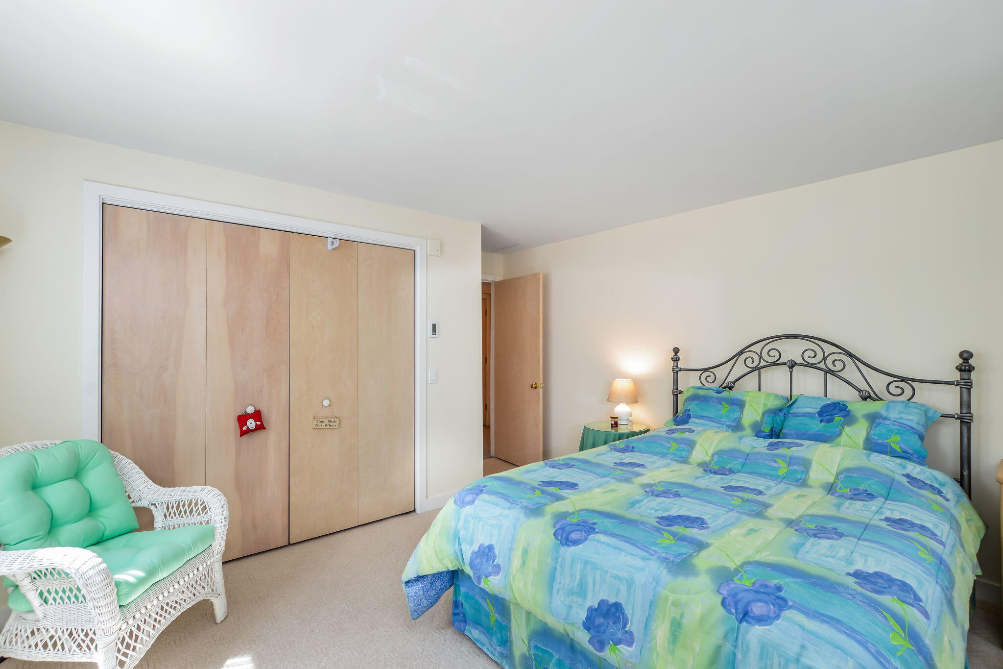 240 Surf Drive Mashpee, MA 02649 - Photo 22 of 37 a bedroom with a bed and a couch