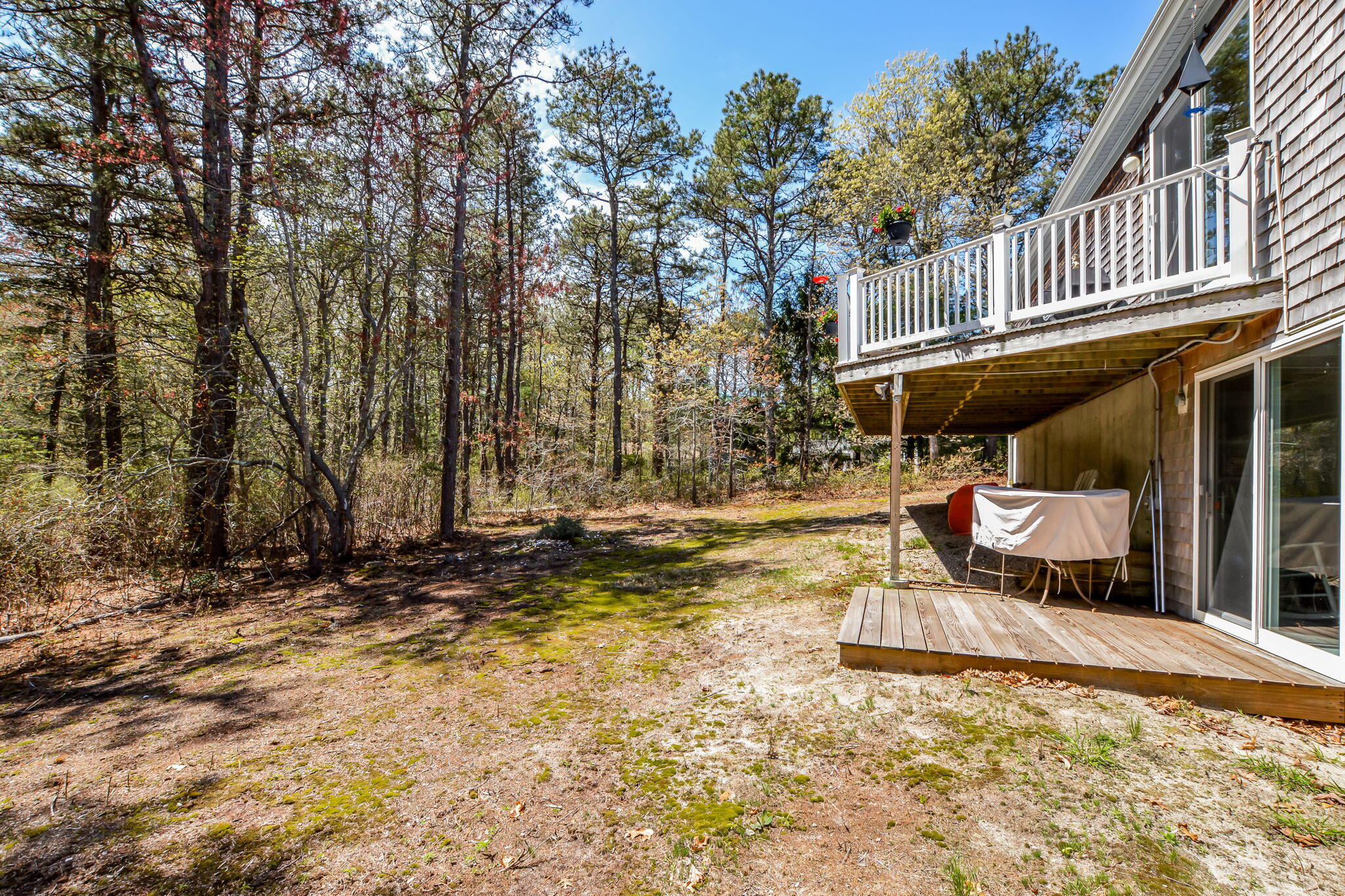 240 Surf Drive Mashpee, MA 02649 - Photo 26 of 37 a view of a fountain with wooden fence