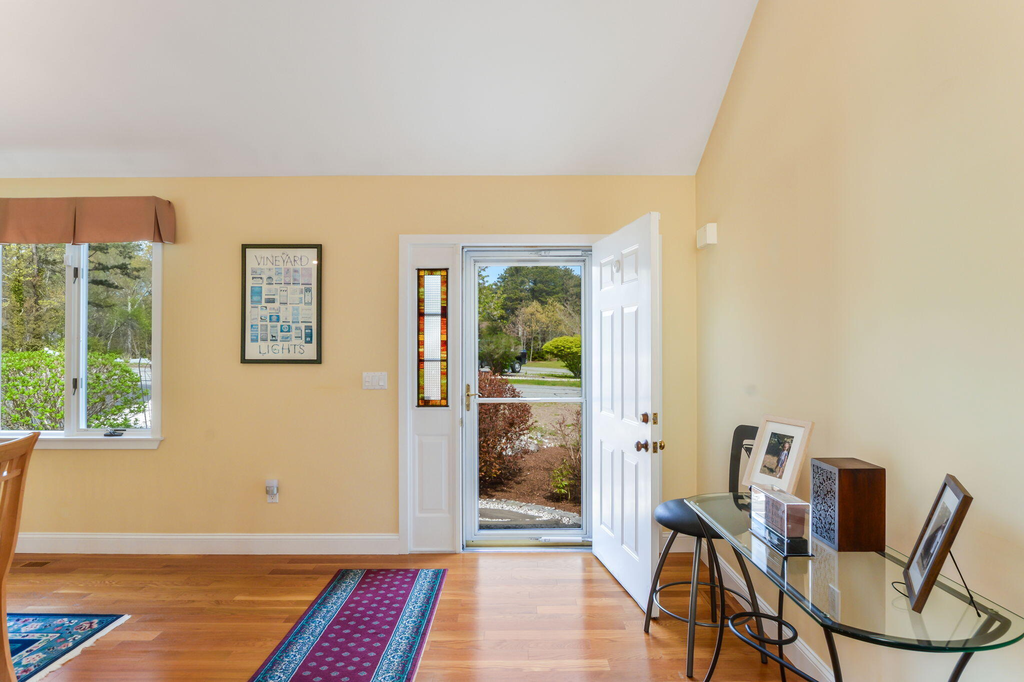 240 Surf Drive Mashpee, MA 02649 - Photo 5 of 37 a view of a livingroom with furniture and front door