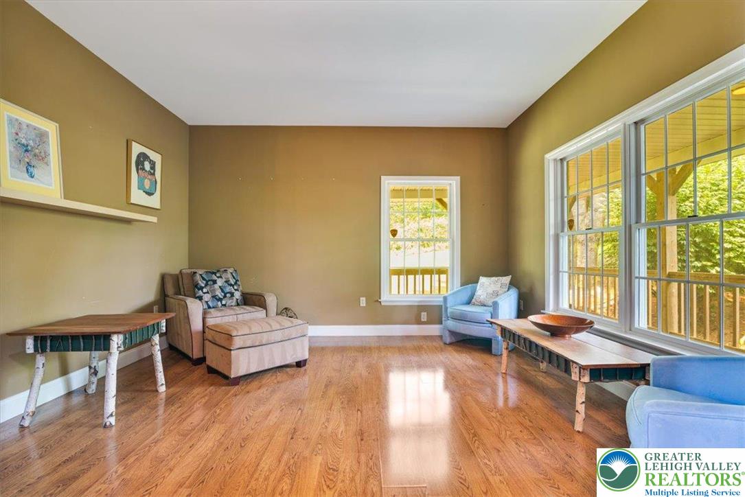 1488 Kelly Road Stroudsburg, PA 18360 - Photo 28 of 89 a living room with furniture and a large window