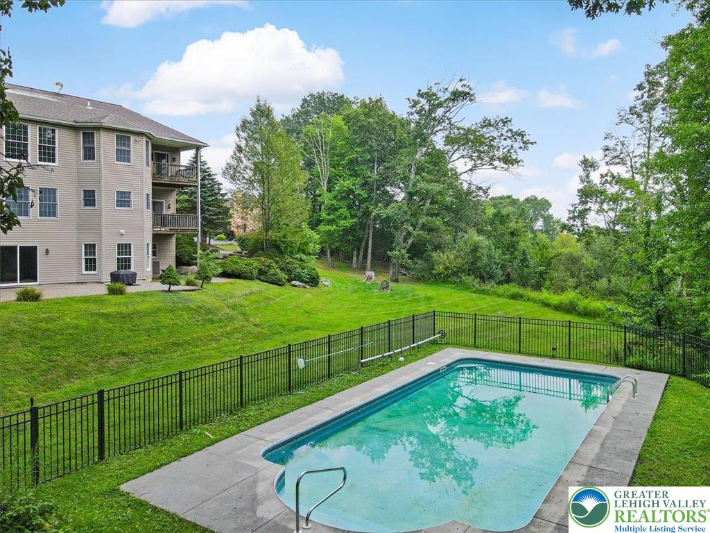 1488 Kelly Road Stroudsburg, PA 18360 - Photo 76 of 89 a view of a backyard with swimming pool