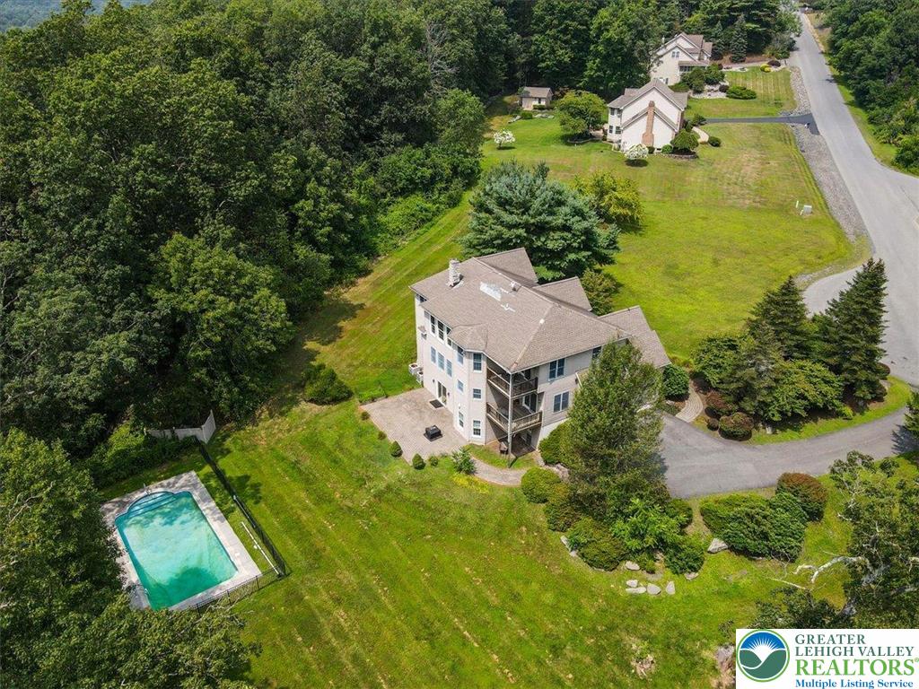 1488 Kelly Road Stroudsburg, PA 18360 - Photo 81 of 89 an aerial view of a house with a garden