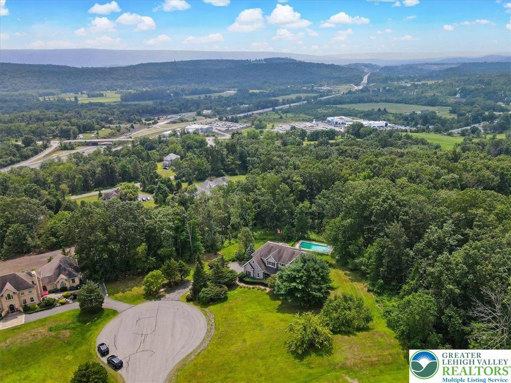 1488 Kelly Road Stroudsburg, PA 18360 - Photo 86 of 89 an aerial view of a houses with a yard