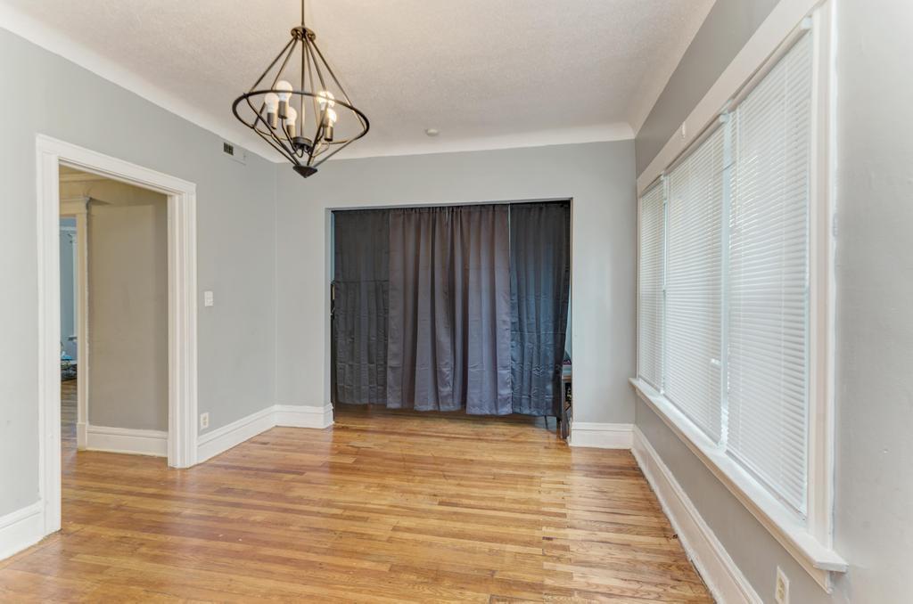 6840 South Prairie Avenue Chicago, IL 60637 - Photo 17 of 47 a view of a chandelier and wooden floor