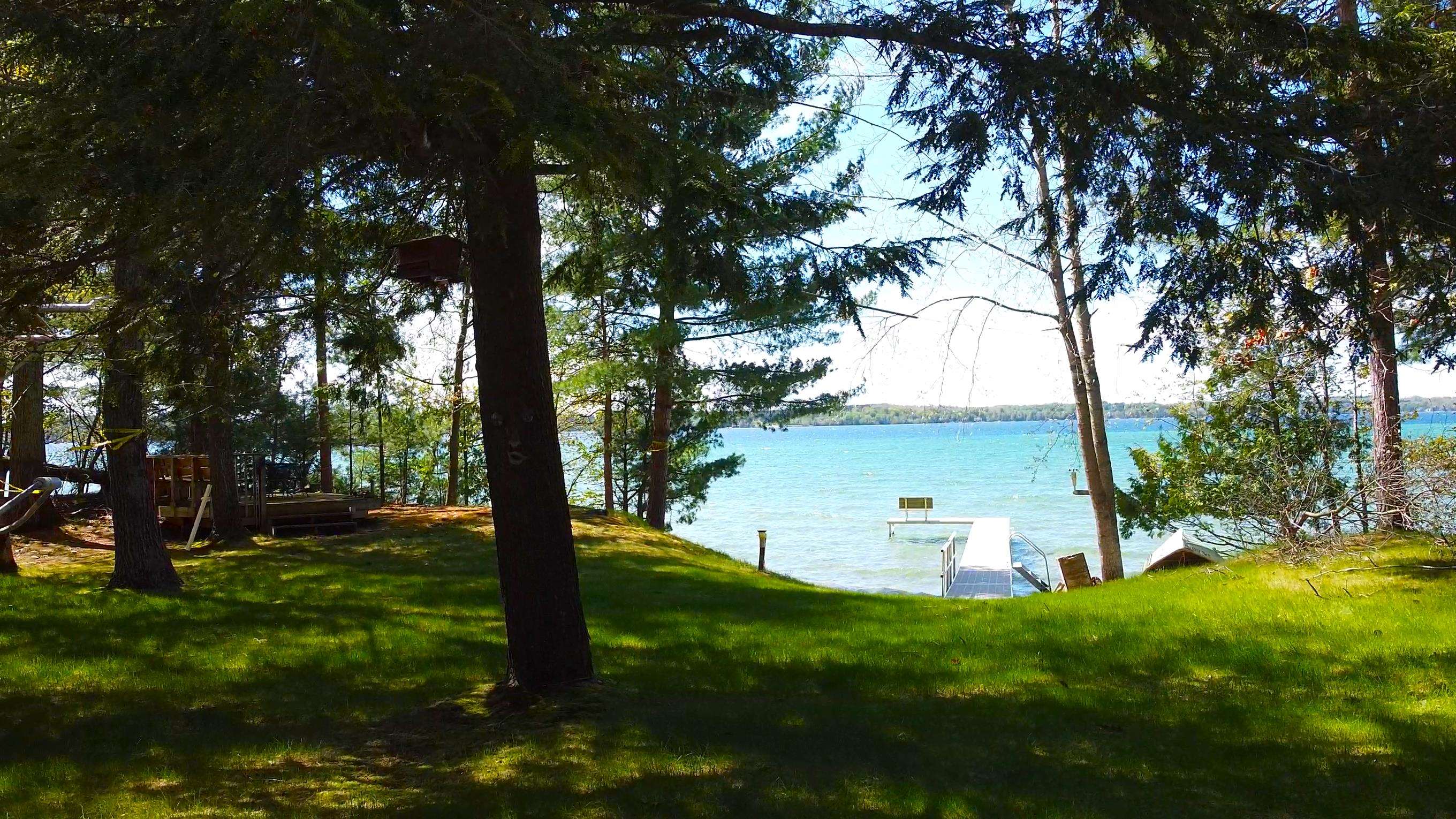 8645 Skegemog Point Road Williamsburg, MI 49690 - Photo 3 of 71