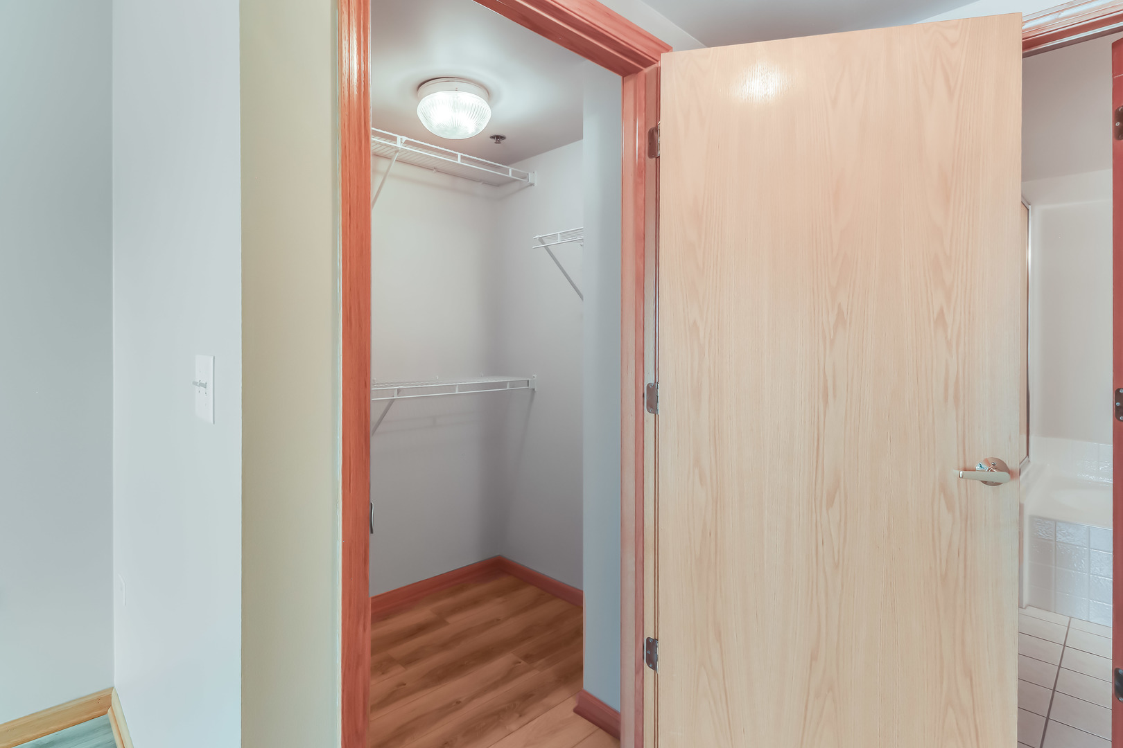 1200 South Prospect Avenue, Unit 303 Elmhurst, IL 60126 - Photo 9 of 21 a view of a hallway with wooden floor