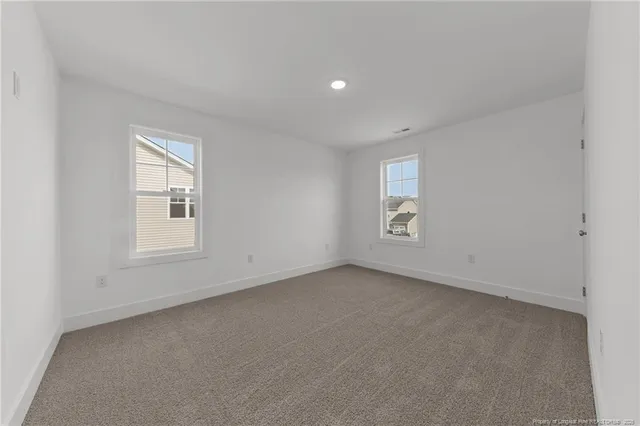 a view of small space with empty racks on the wall