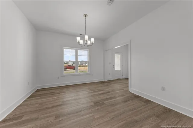 an empty room with mirror