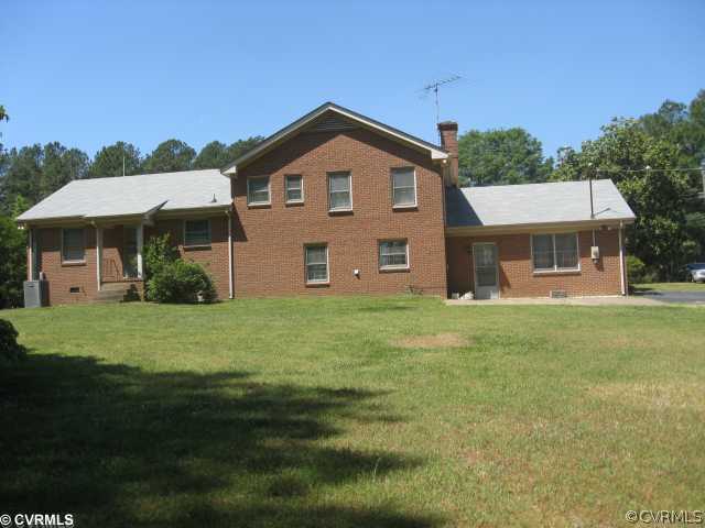 13701 Courthouse Road Dinwiddie, VA 23841 - Photo 3 of 5 a view of a house with a yard