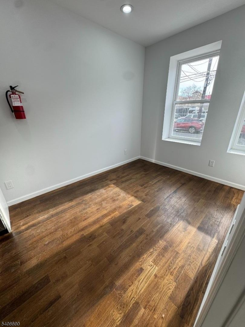 196 Malvern Street, Unit 3 Newark, NJ 07105 - Photo 7 of 16 a view of an empty room and window