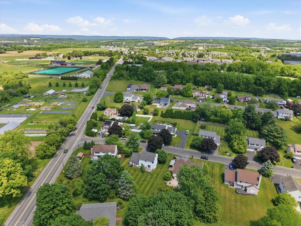 808 Hunter Road Easton, PA 18040 - Photo 41 of 41 An aerial perspective showcases a vibrant neighborhood nestled among lush green landscapes.