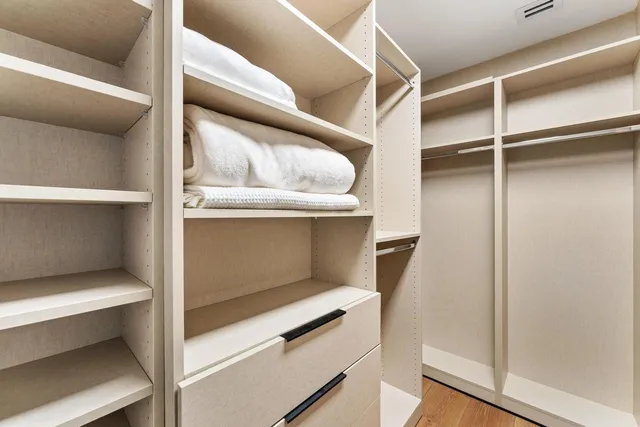 a room with furniture and a ceiling fan