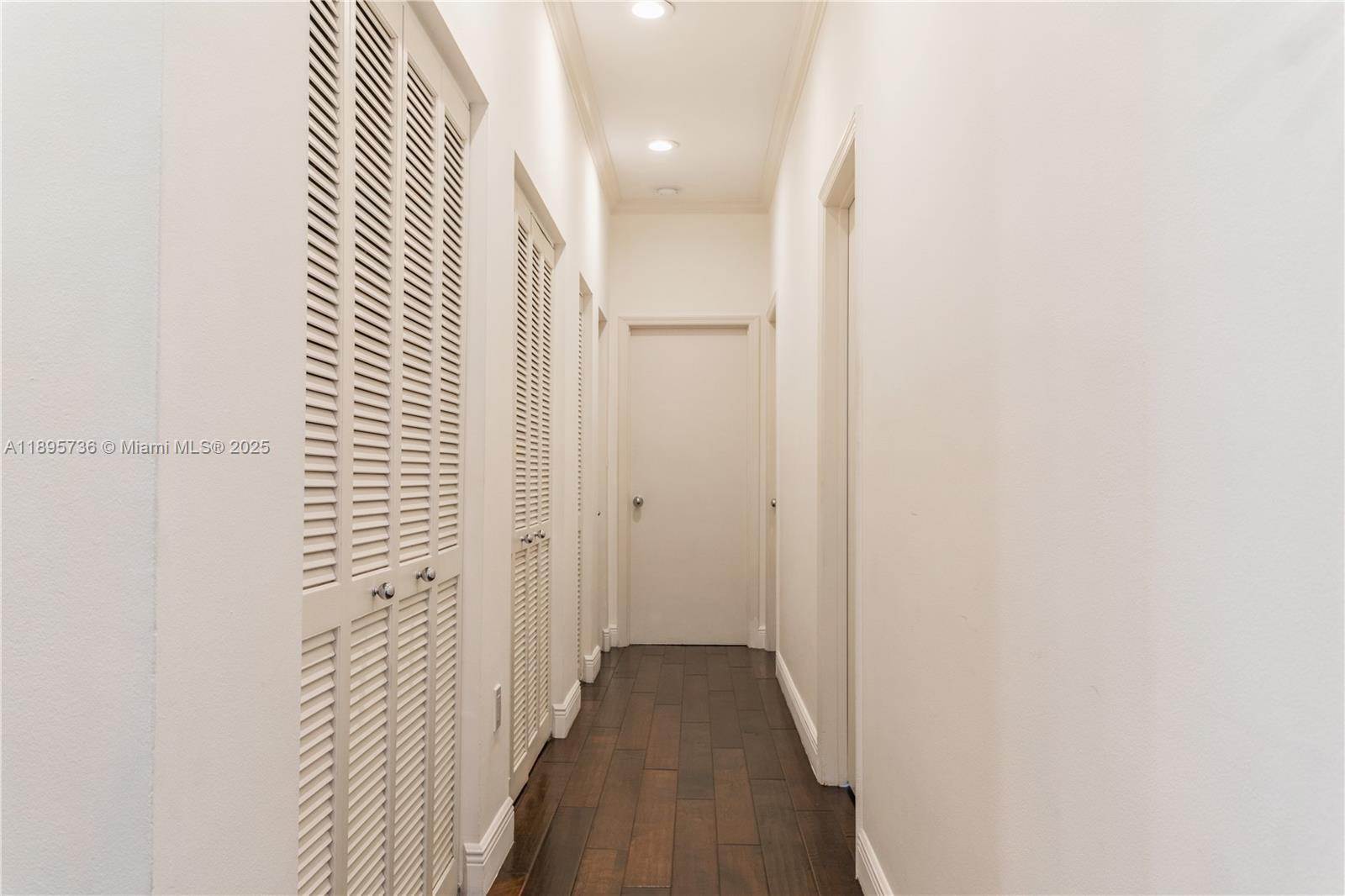 5774 Southwest 76th Terrace South Miami, FL 33143 - Photo 20 of 38 a view of a bathroom from a hallway