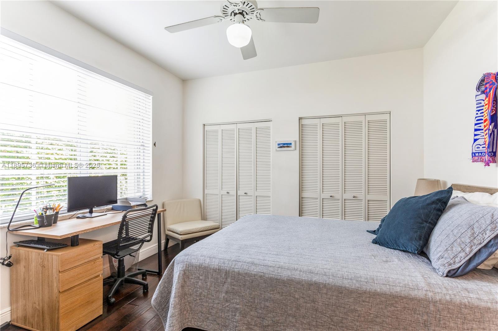 5774 Southwest 76th Terrace South Miami, FL 33143 - Photo 30 of 38 a bedroom with a workspace