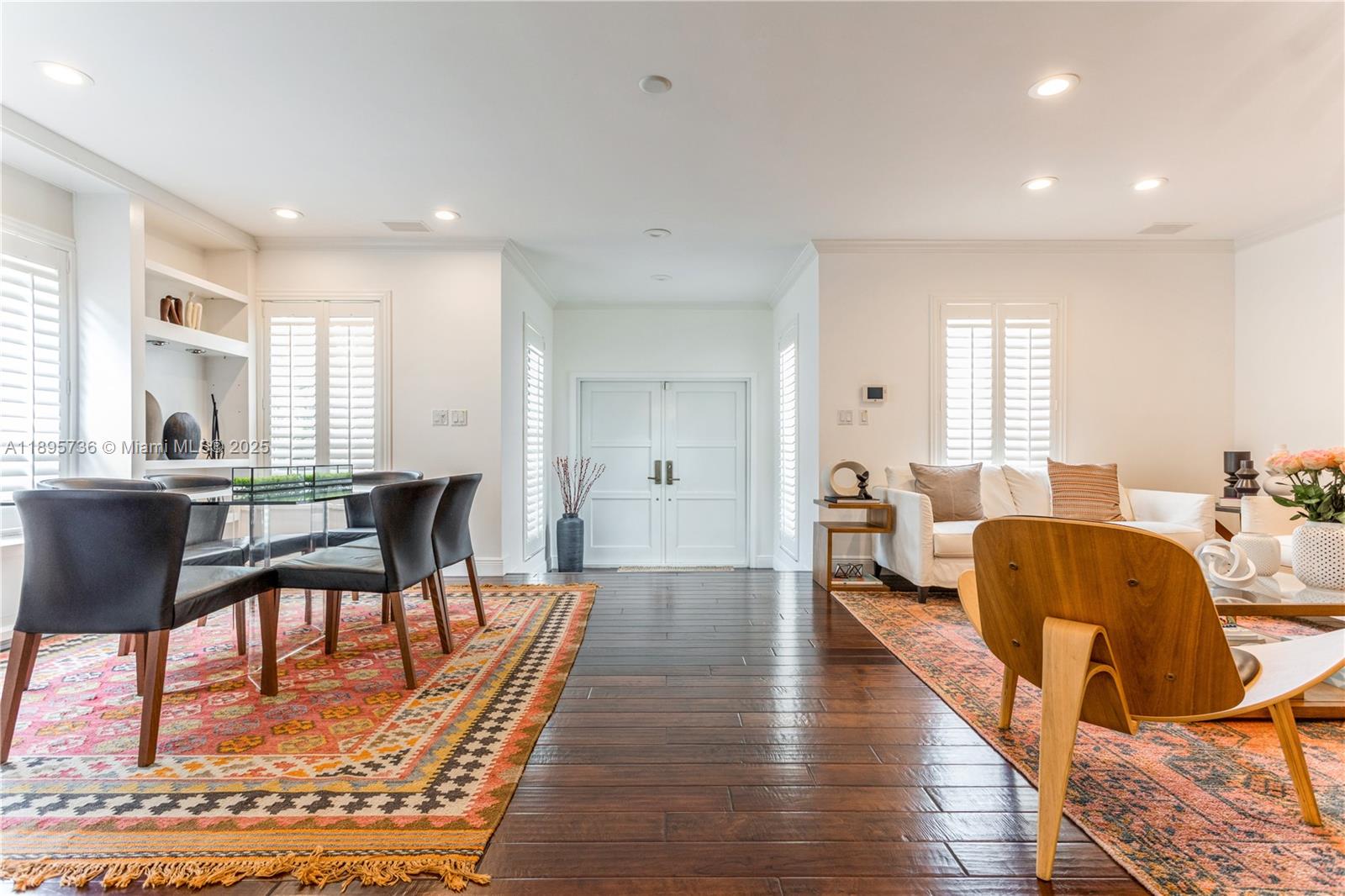5774 Southwest 76th Terrace South Miami, FL 33143 - Photo 5 of 38 a living room with furniture and wooden floor