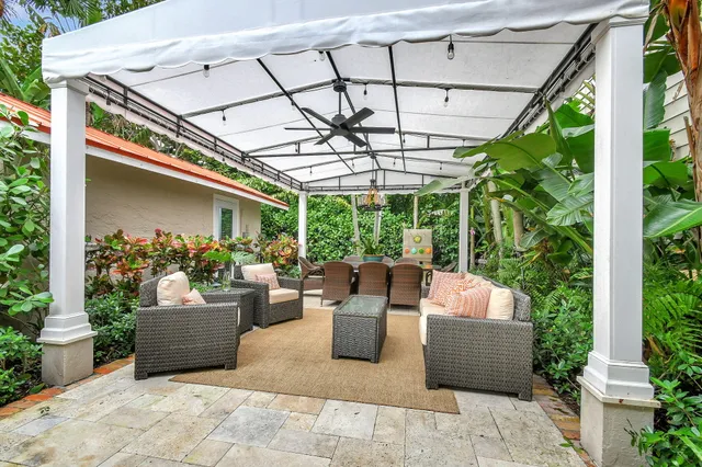 a bathroom with a shower a toilet and sink