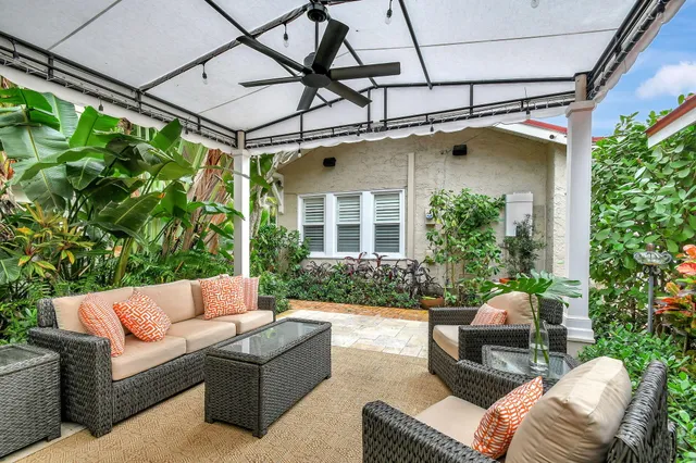 a outdoor living space with furniture and garden view