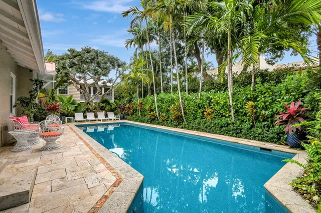 a view of swimming pool from a balcony