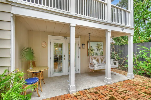 a view of a swimming pool with a potted plants