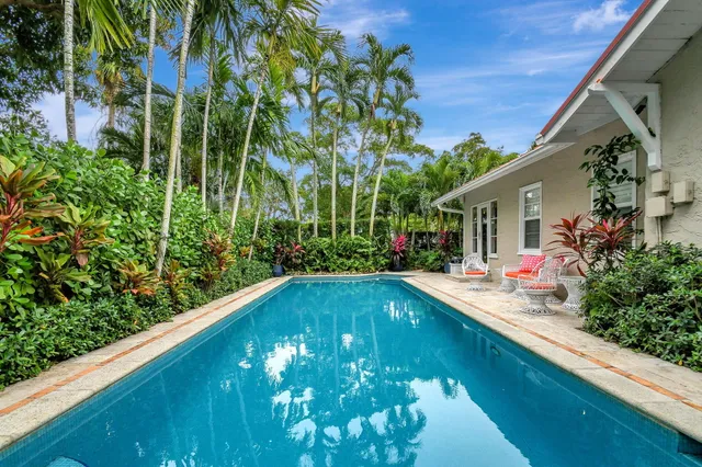 a view of swimming pool from a balcony