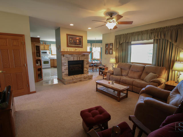 3617 East 1759th Road Ottawa, IL 61350 - Photo 4 of 20 a living room with furniture and a fireplace