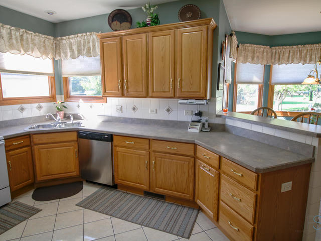 3617 East 1759th Road Ottawa, IL 61350 - Photo 8 of 20 a kitchen with stainless steel appliances a sink window and cabinets