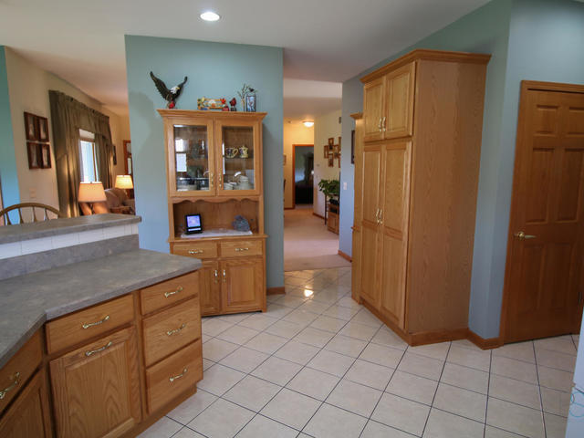 3617 East 1759th Road Ottawa, IL 61350 - Photo 9 of 20 a kitchen with stainless steel appliances a refrigerator and cabinets