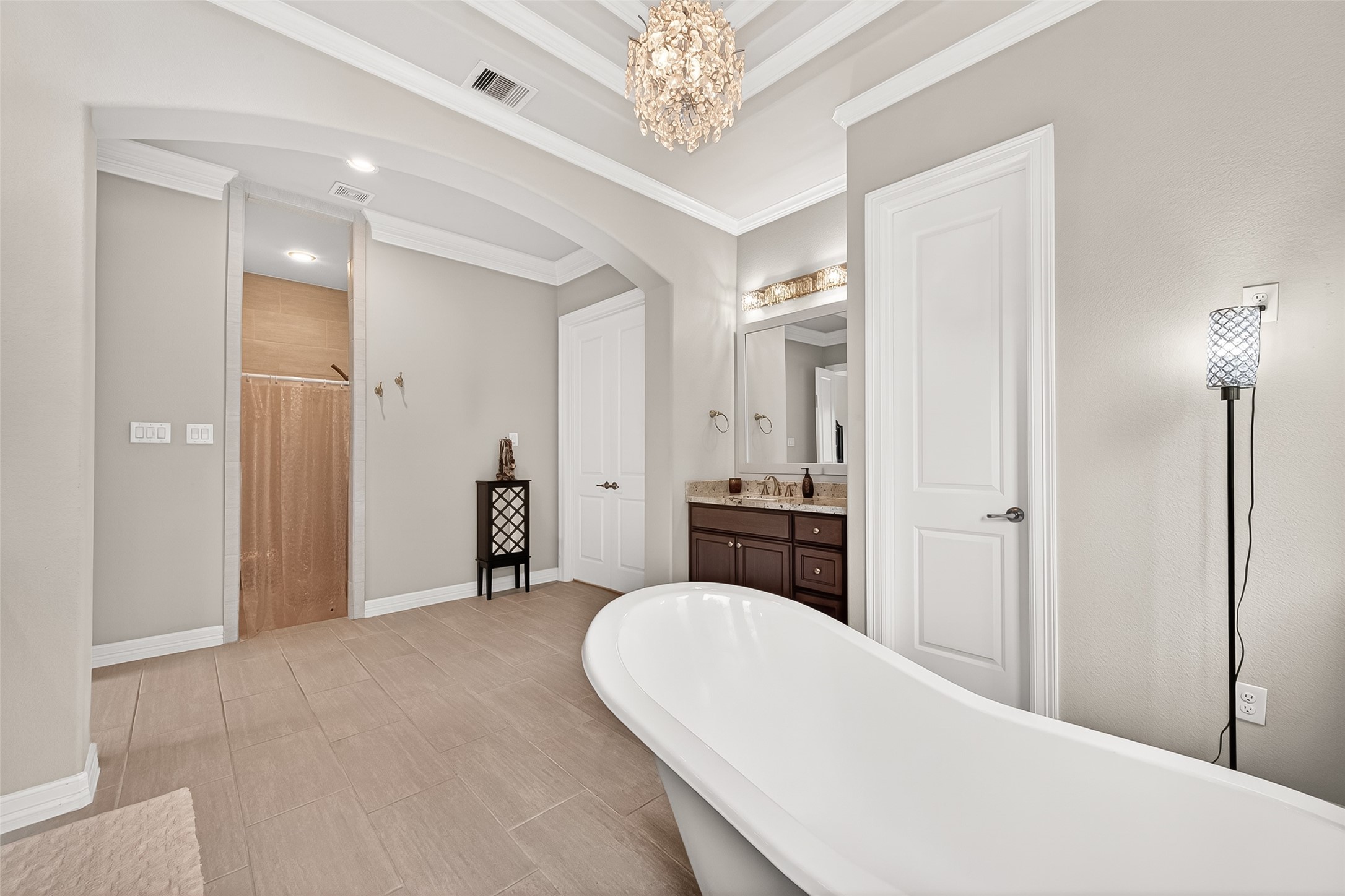 32607 Wingfoot Circle Fulshear, TX 77441 - Photo 33 of 39 A view from the standalone tub shows the spaciousness of this bathroom. Plenty of room to move and to prepare and end busy days.