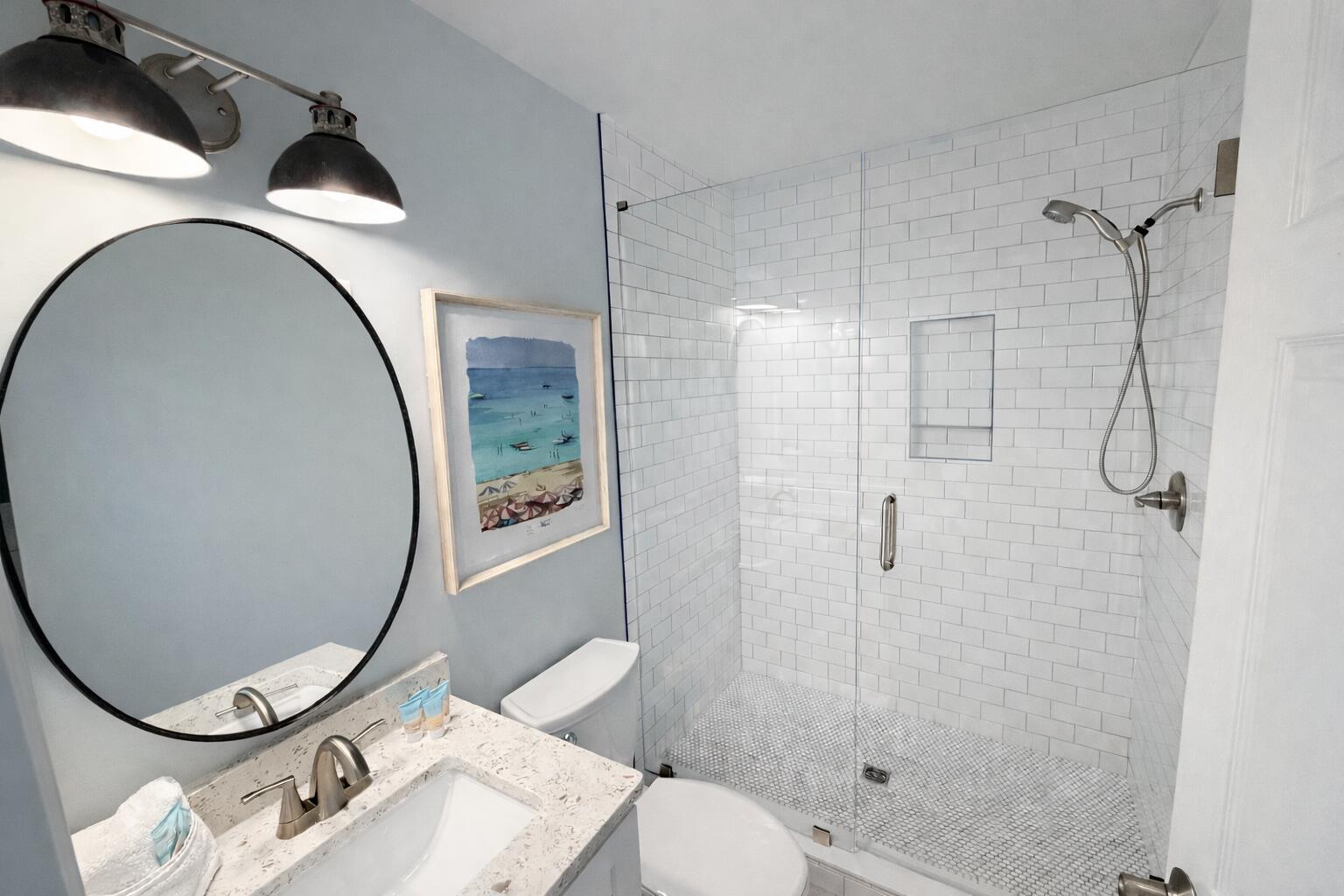 5191 Clipper Way Port St. Joe, FL 32456 - Photo 16 of 23 a bathroom with a sink mirror and toilet