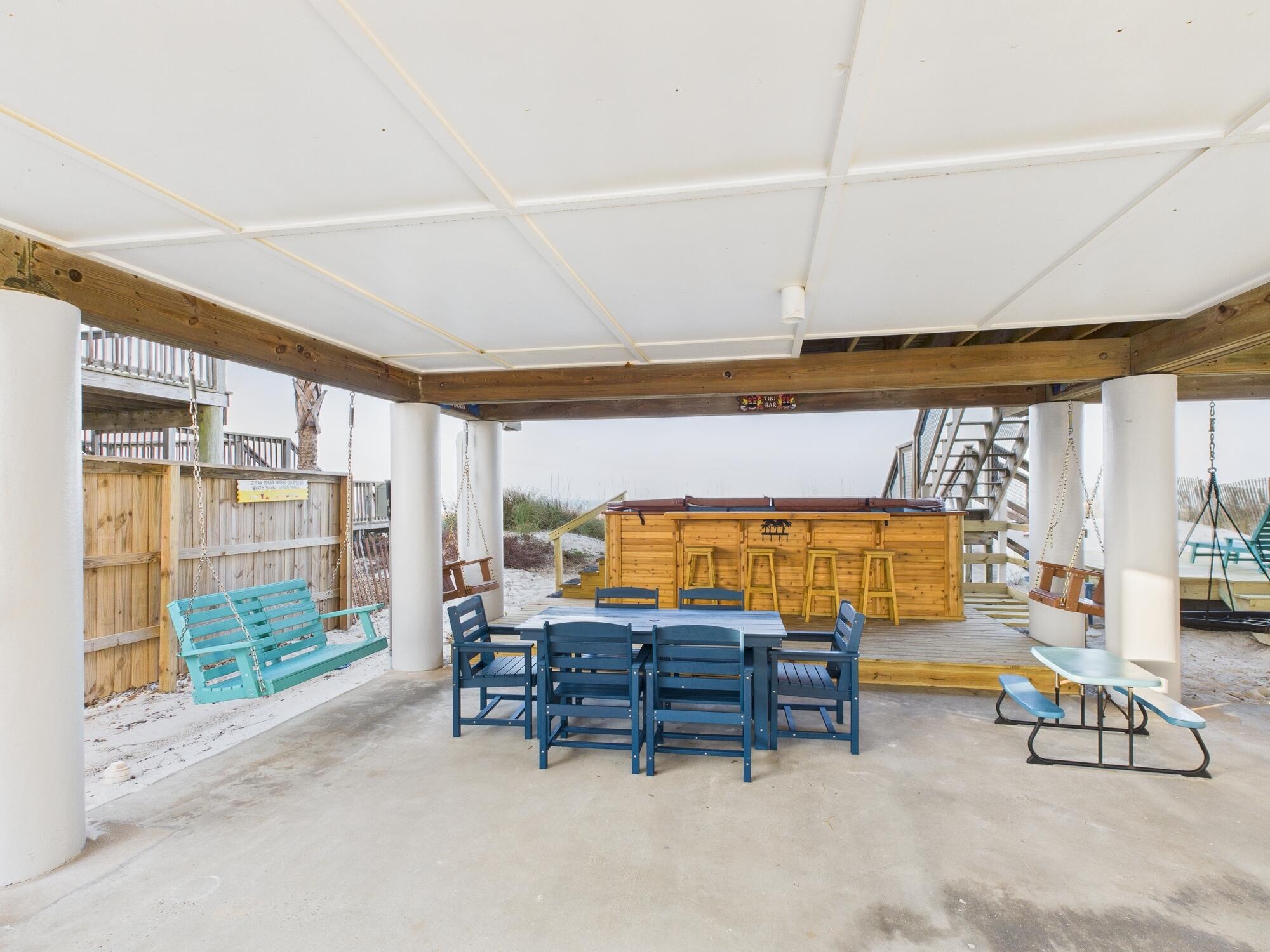 5191 Clipper Way Port St. Joe, FL 32456 - Photo 19 of 23 a living room with furniture and a floor to ceiling window