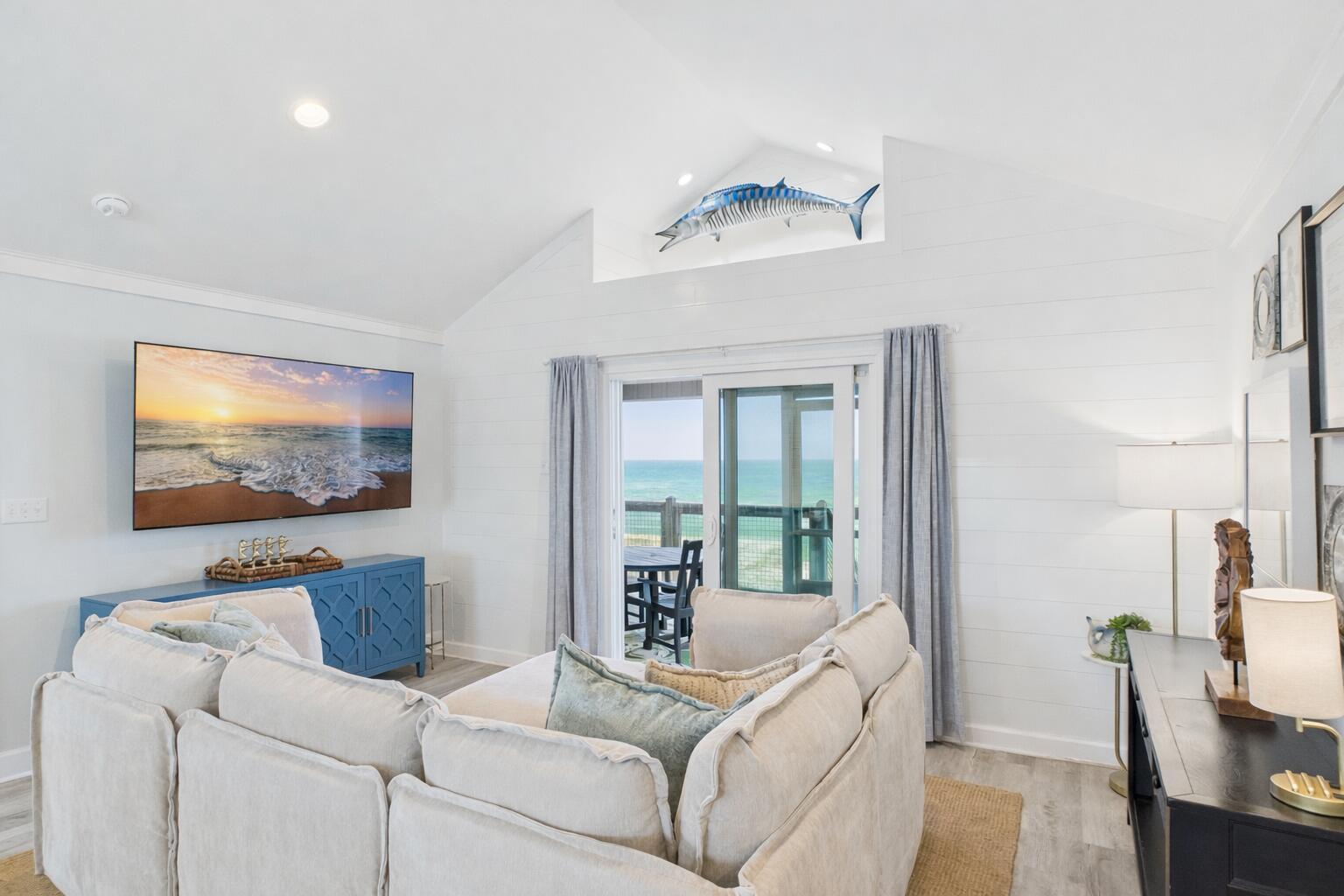 5191 Clipper Way Port St. Joe, FL 32456 - Photo 6 of 23 a living room with furniture and a flat screen tv