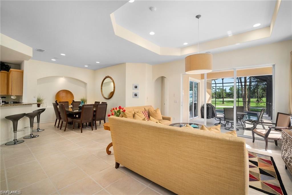 8519 Chase Preserve Drive Naples, FL 34113 - Photo 3 of 29 a living room with furniture and a large window