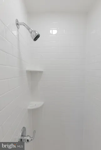 a close view of a shower in the bathroom